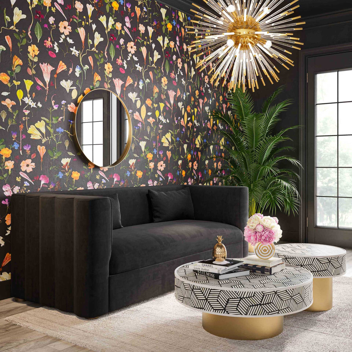 Black velvet upholstery and scalloped sides bring modern glamour to a low-profile sofa