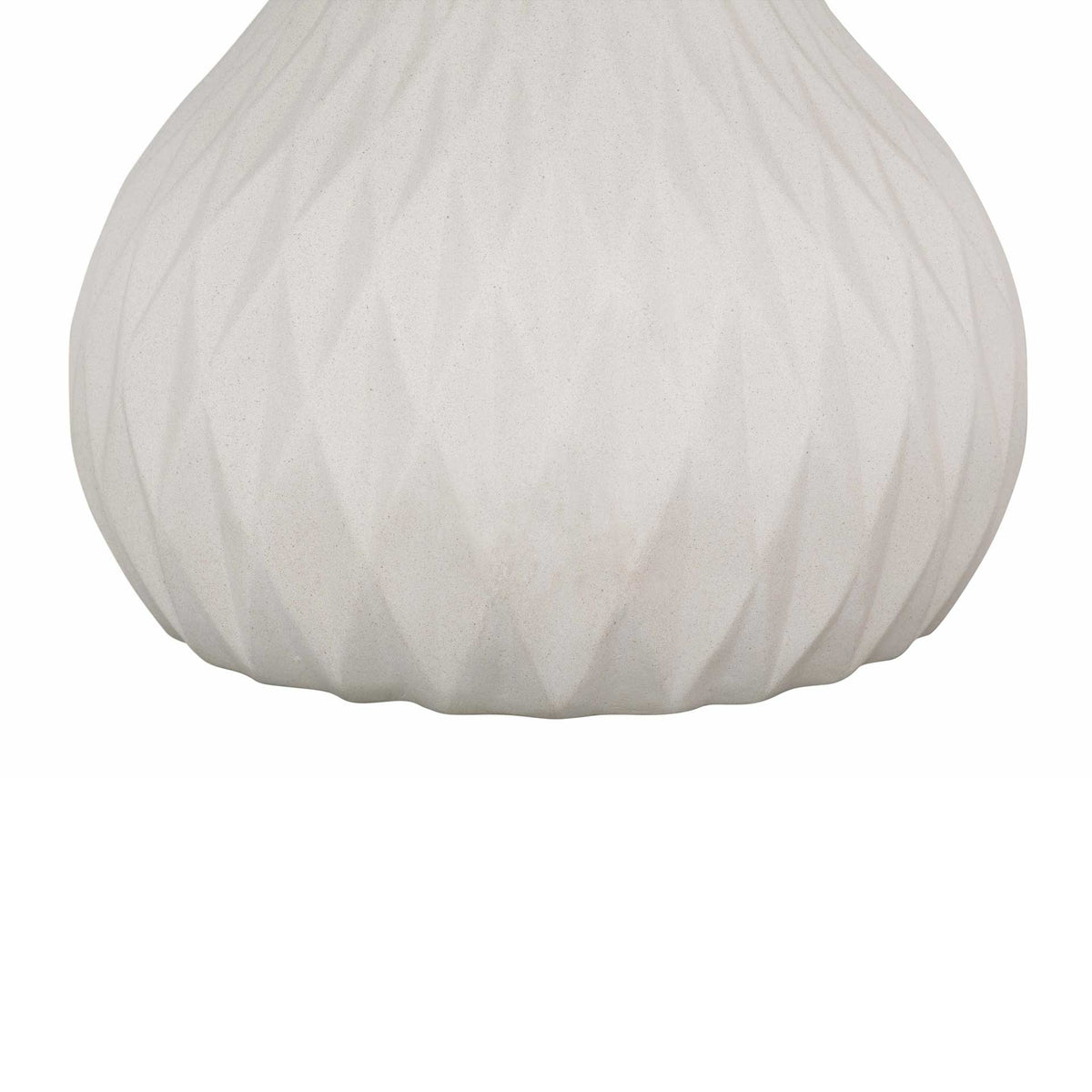 Faceted diamond detailing adds sculptural texture to the ivory concrete pedestal