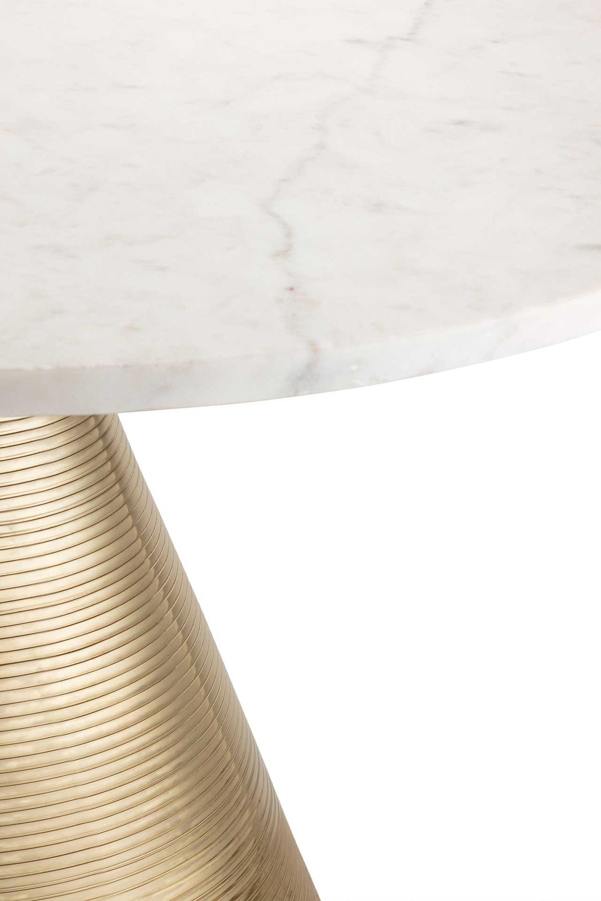 Subtle marble veining pairs with finely grooved gold for a rich mix of textures.