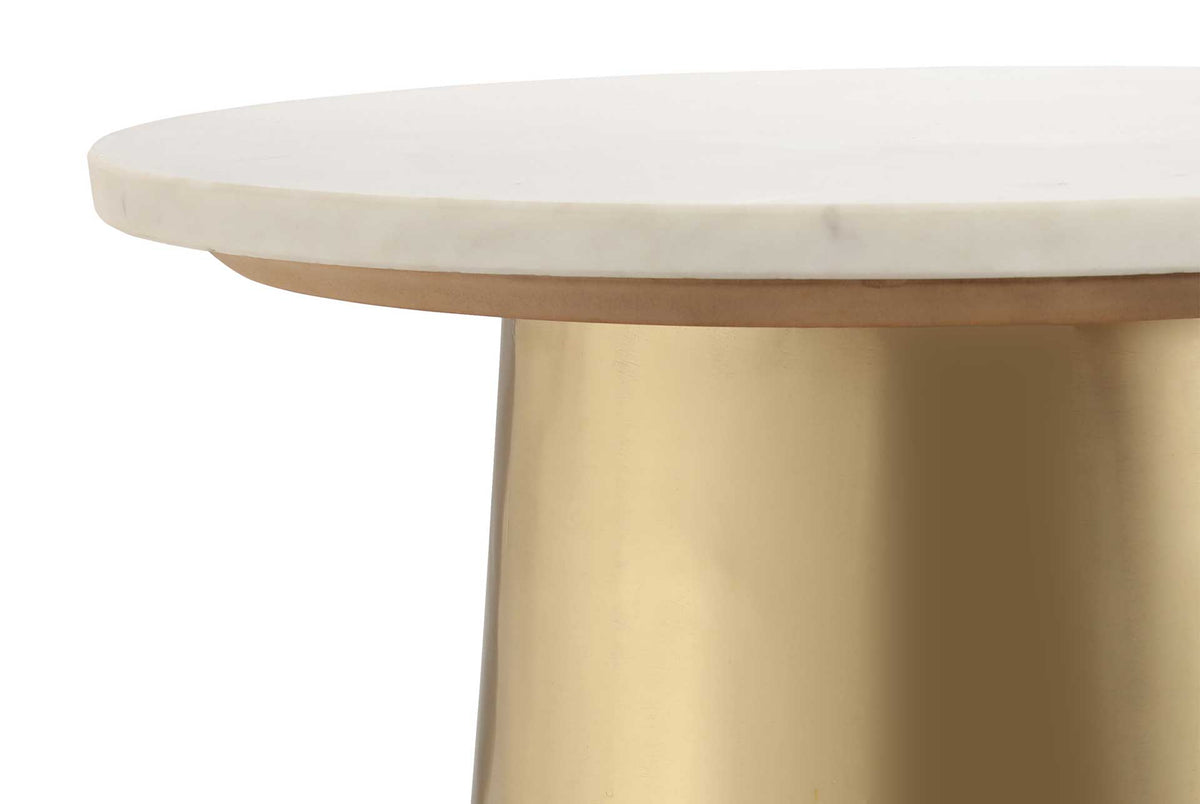 A smooth white marble edge rests above a slim gold band for a refined contrast of materials