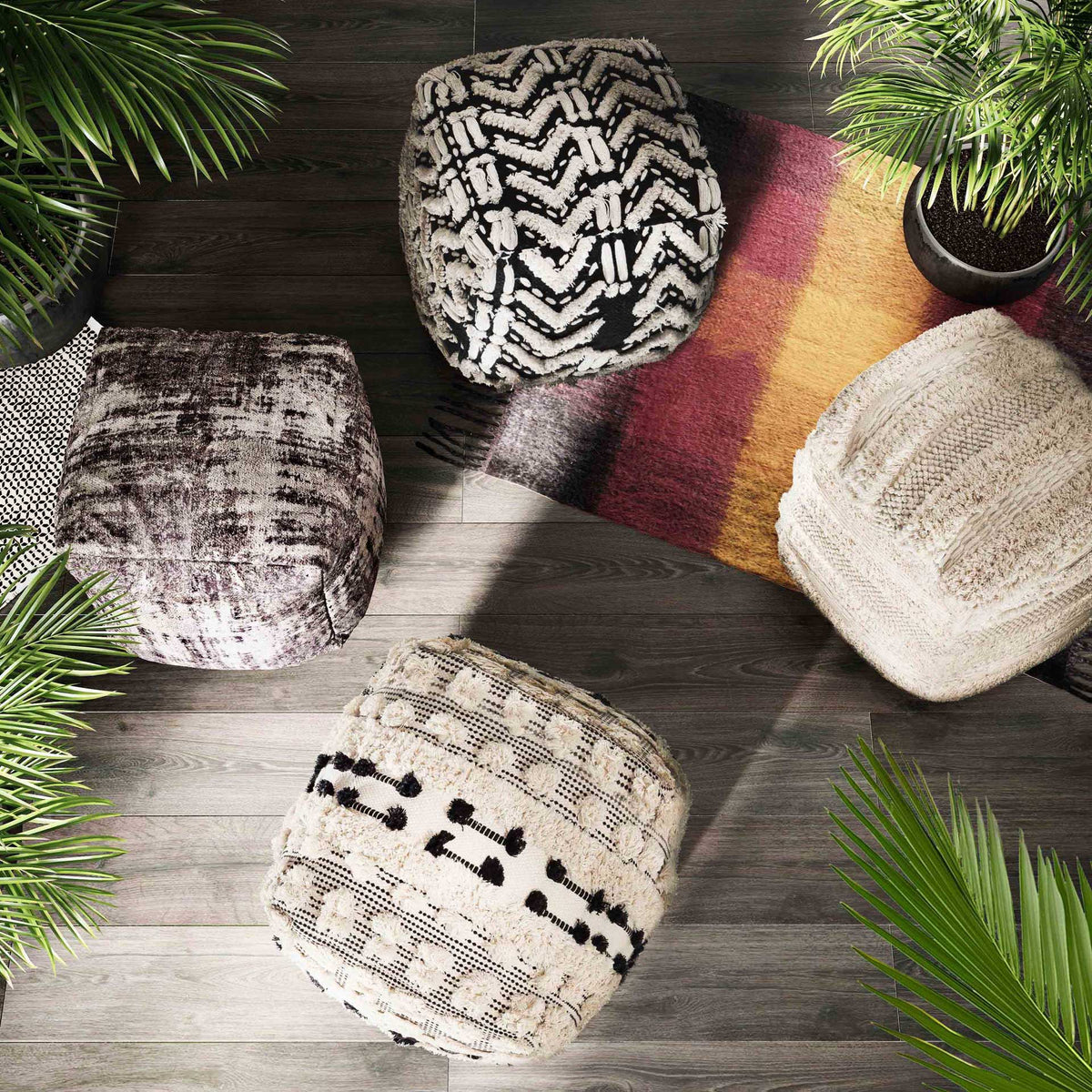 Neutral cotton and shaggy tufted stripes make this cube pouf a cozy companion to colorful decor