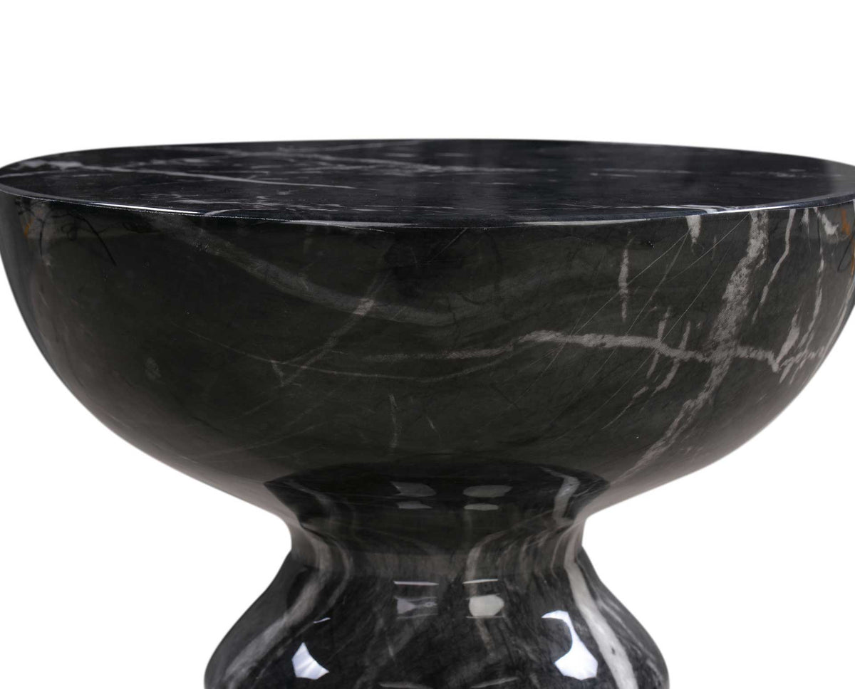 Glossy black marble-look finish wraps a rounded tabletop edge and gracefully curved neck