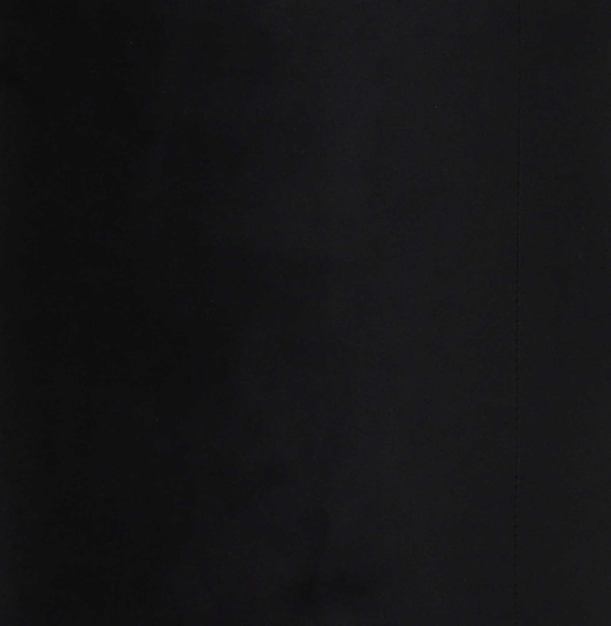 Smooth black velvet and neat vertical stitching create a clean, tailored finish.