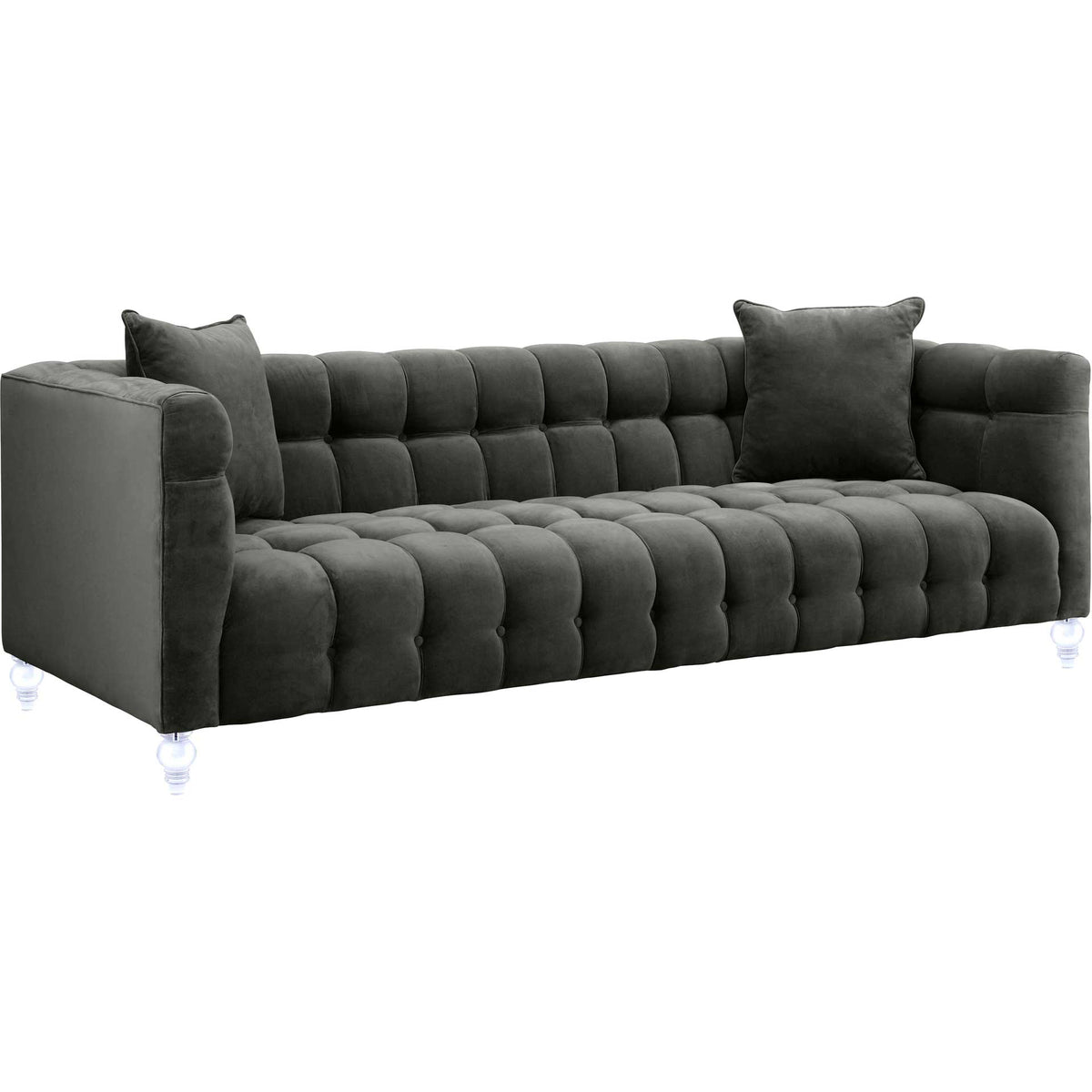 Charcoal gray velvet sofa with plush tufting, two matching pillows, and clear turned legs || TOV-S100 || front_angle_studio