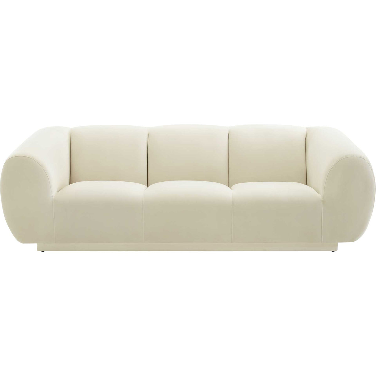 Three cushioned seats and a softly curved silhouette give this cream velvet sofa an inviting feel || TOV-S6445 || front_studio