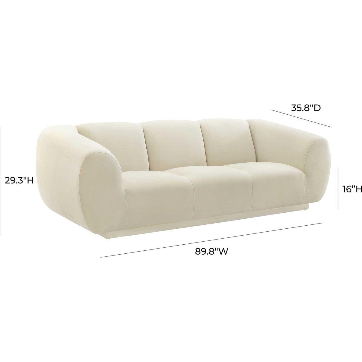 Spacious cream velvet seating pairs a low silhouette with thick padding and curved arms