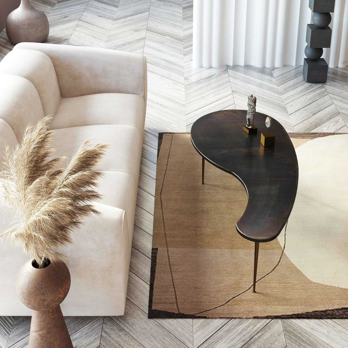 Cream velvet and sculpted curves bring soft texture to a living space with warm neutral accents