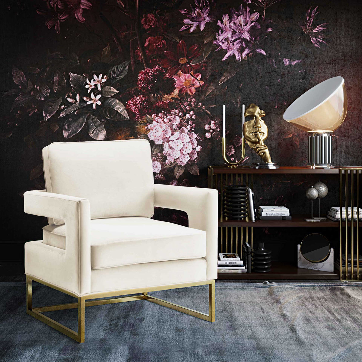 Cream velvet and polished gold bring soft contrast and relaxed elegance to a richly styled living space.