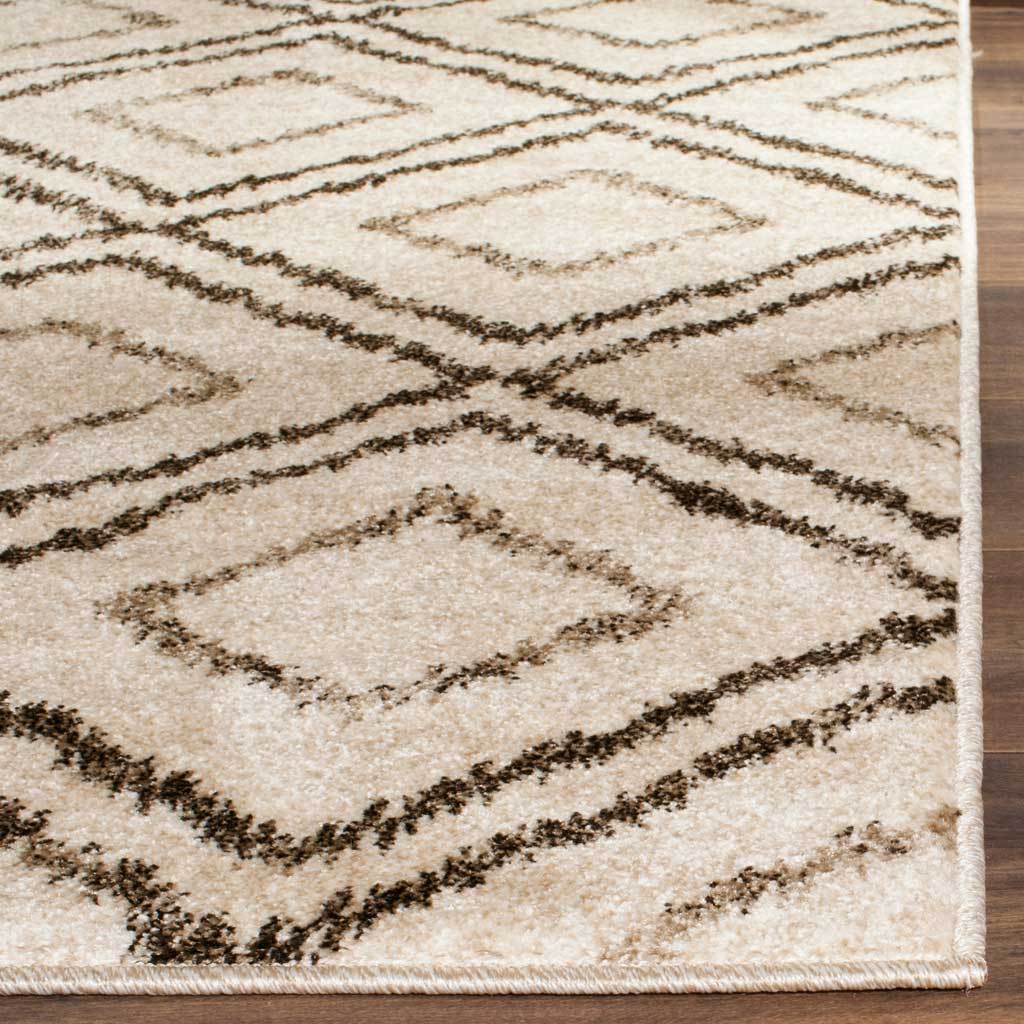Plush cream pile and brown diamond lines meet at a neatly finished edge.