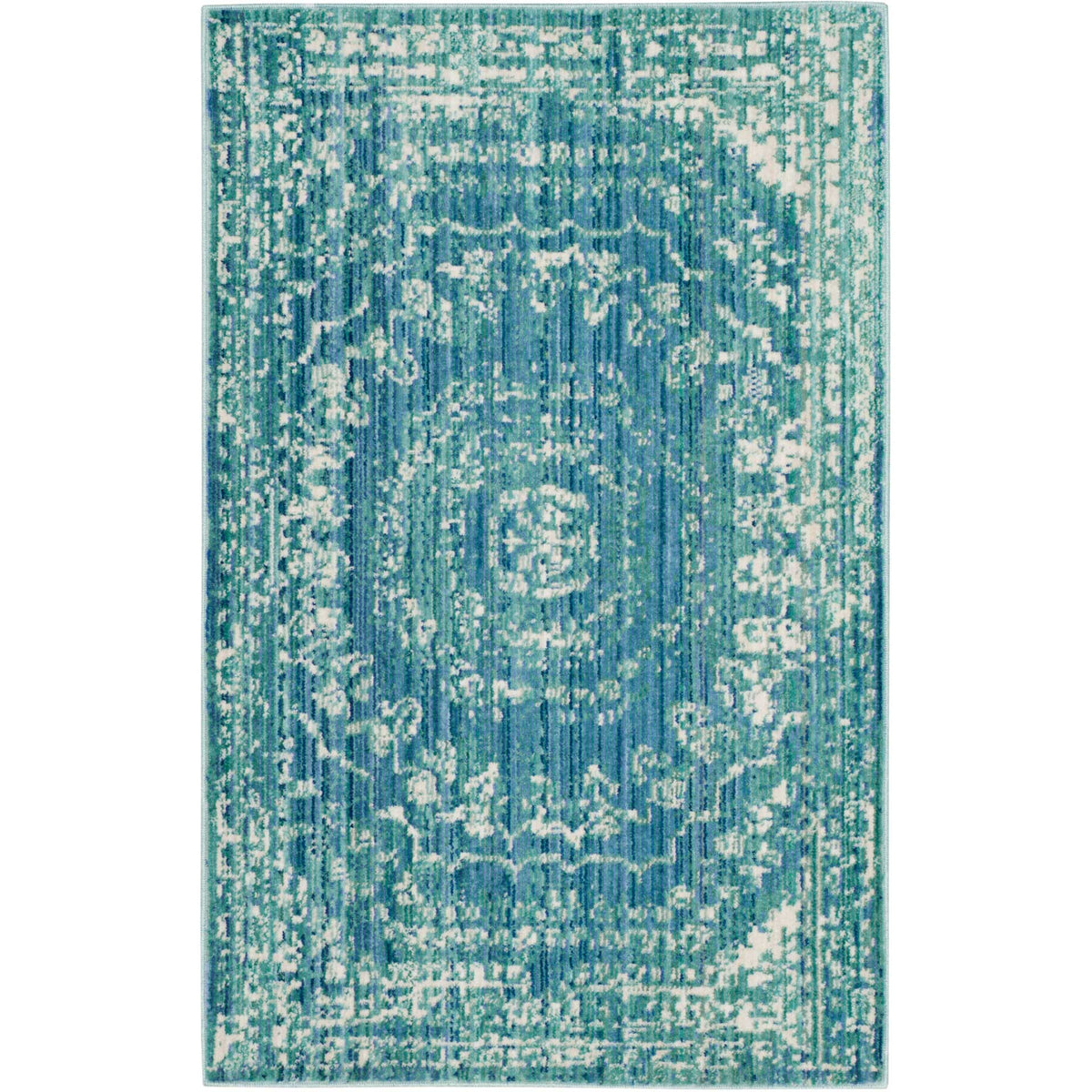 A compact accent rug pairs a rich blue central medallion with weathered aqua detailing.