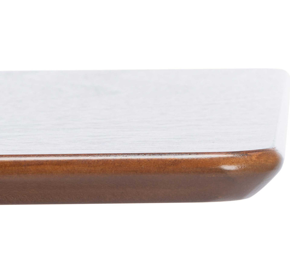 A smooth tabletop has a gently rounded corner and a warm wood-finished edge