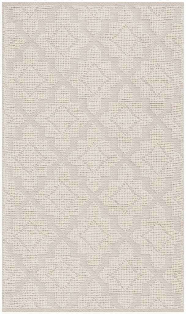 Ivory area rug with a repeating diamond pattern and a textured woven finish
