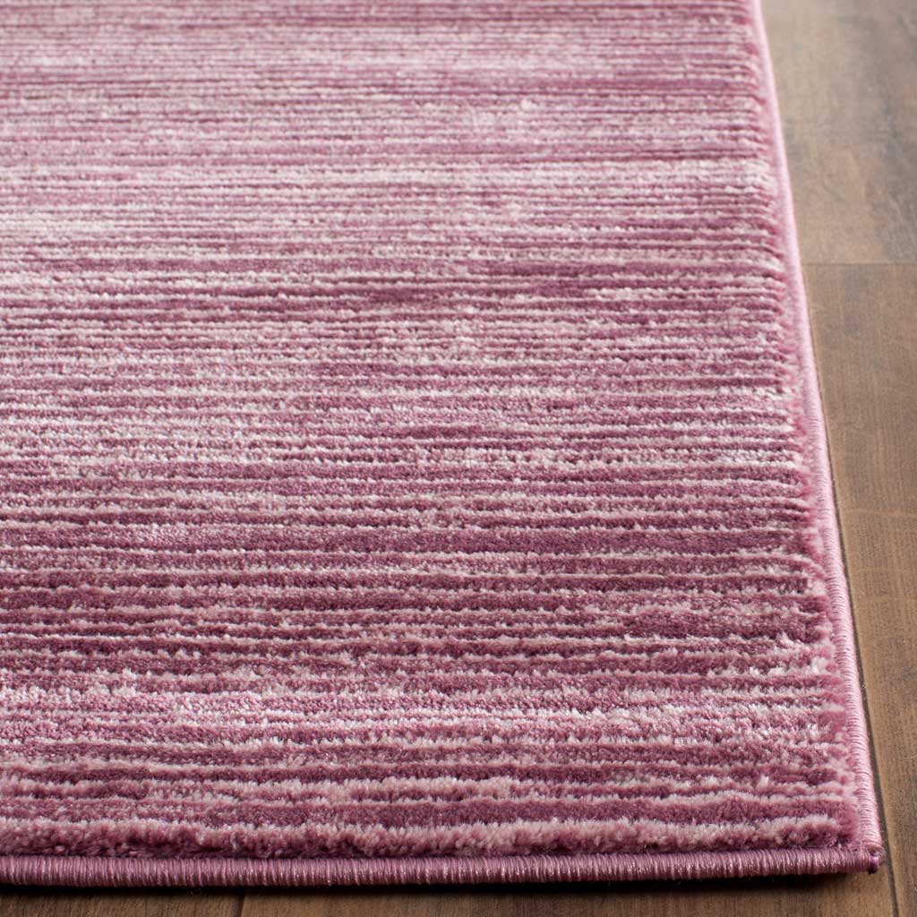 Soft grape pile and a bound corner highlight fine tonal stripes
