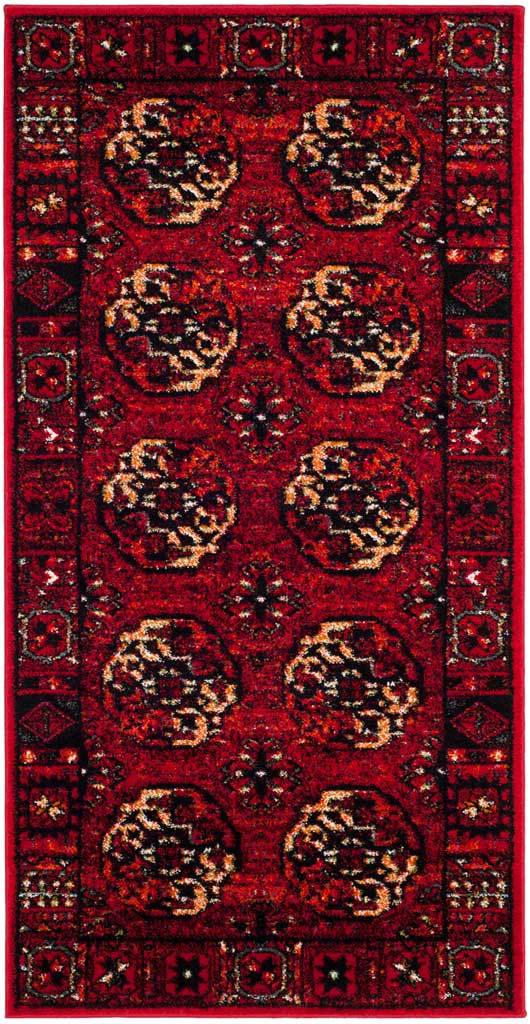 Slim red rug with rows of cream medallions and geometric edging