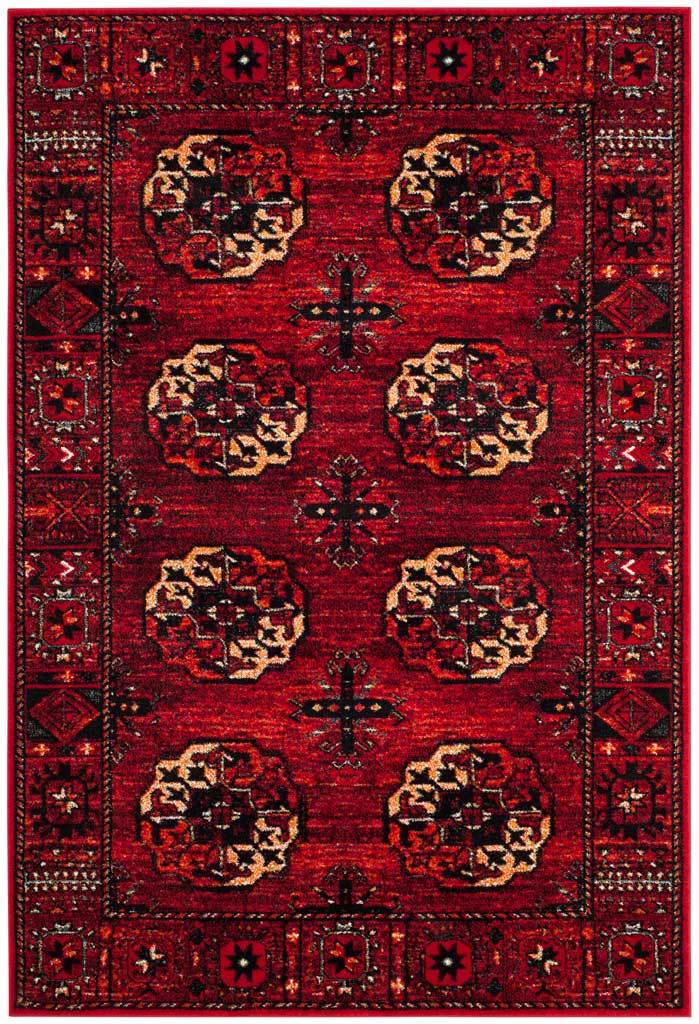 Red rug with repeated cream and black medallions and patterned borders