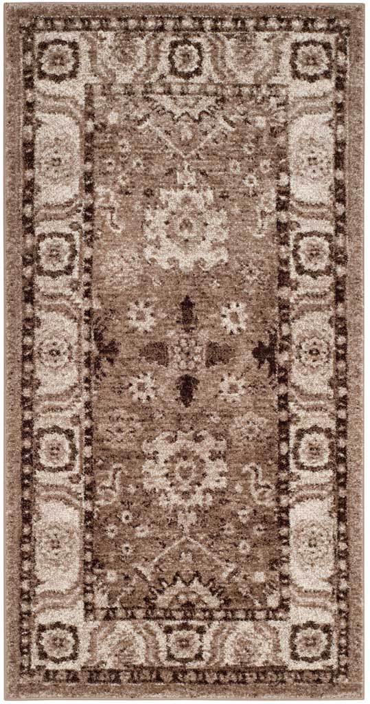 Slim taupe rug with a cream medallion and floral border