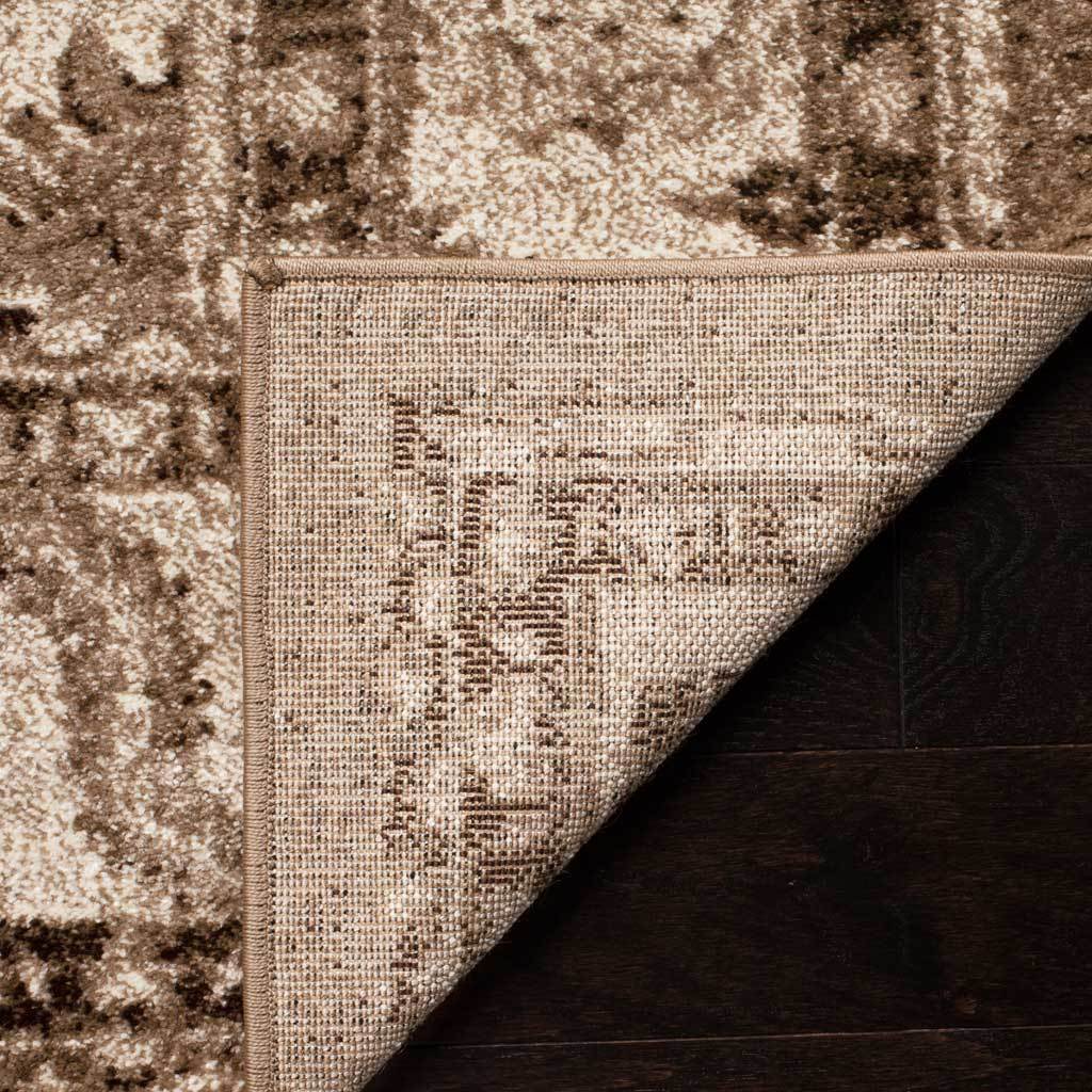 Woven reverse displays the rug's understated taupe pattern