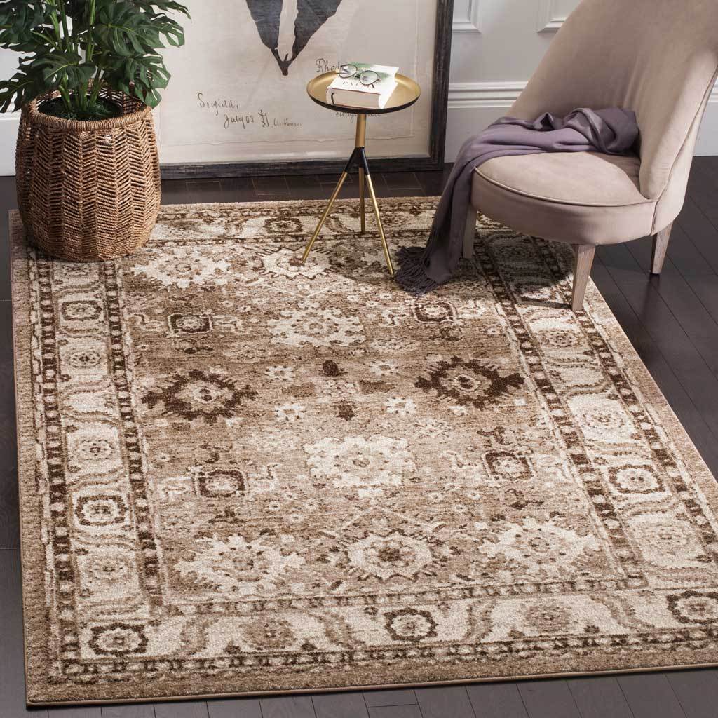 Taupe floral rug softens a seating nook with its neutral, intricate design