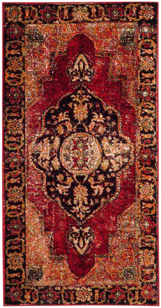 Slim red rug with a dramatic dark medallion and elaborate floral framing