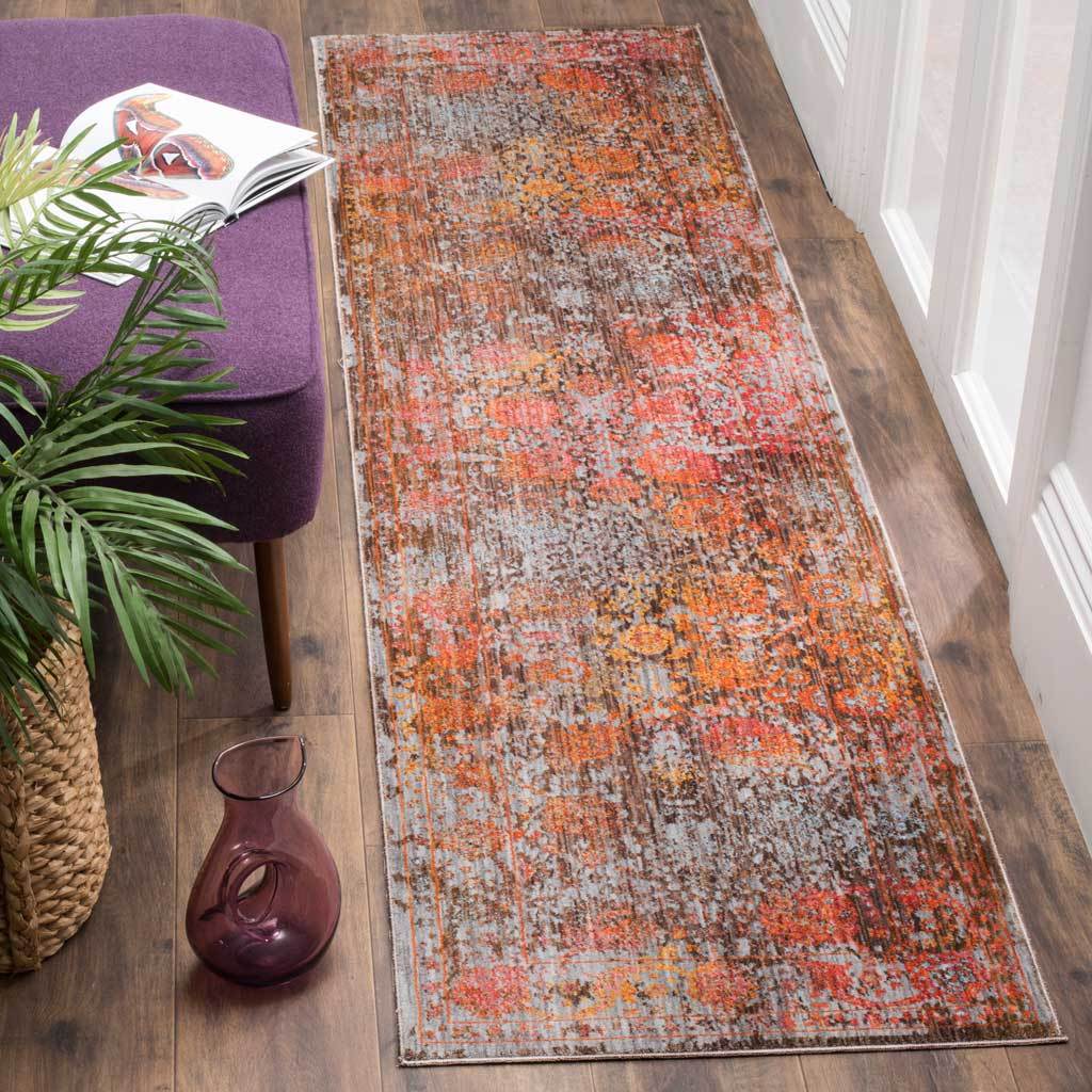 Muted brown runner blends rust, rose, and gray in a distressed floral design