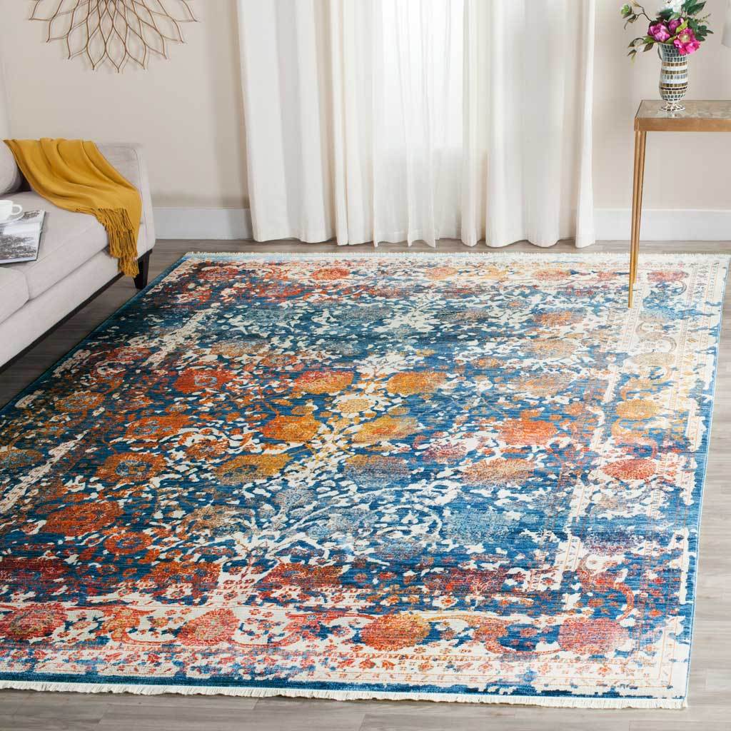 Turquoise floral rug brings layered blue and copper color to a bright room