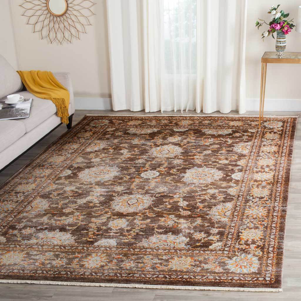 Brown floral rug warms a bright interior with ornate cream accents