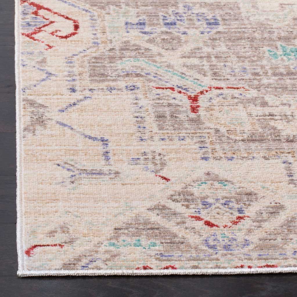 A neatly bound corner showcases the rug's low-profile weave and faded multicolor detailing.