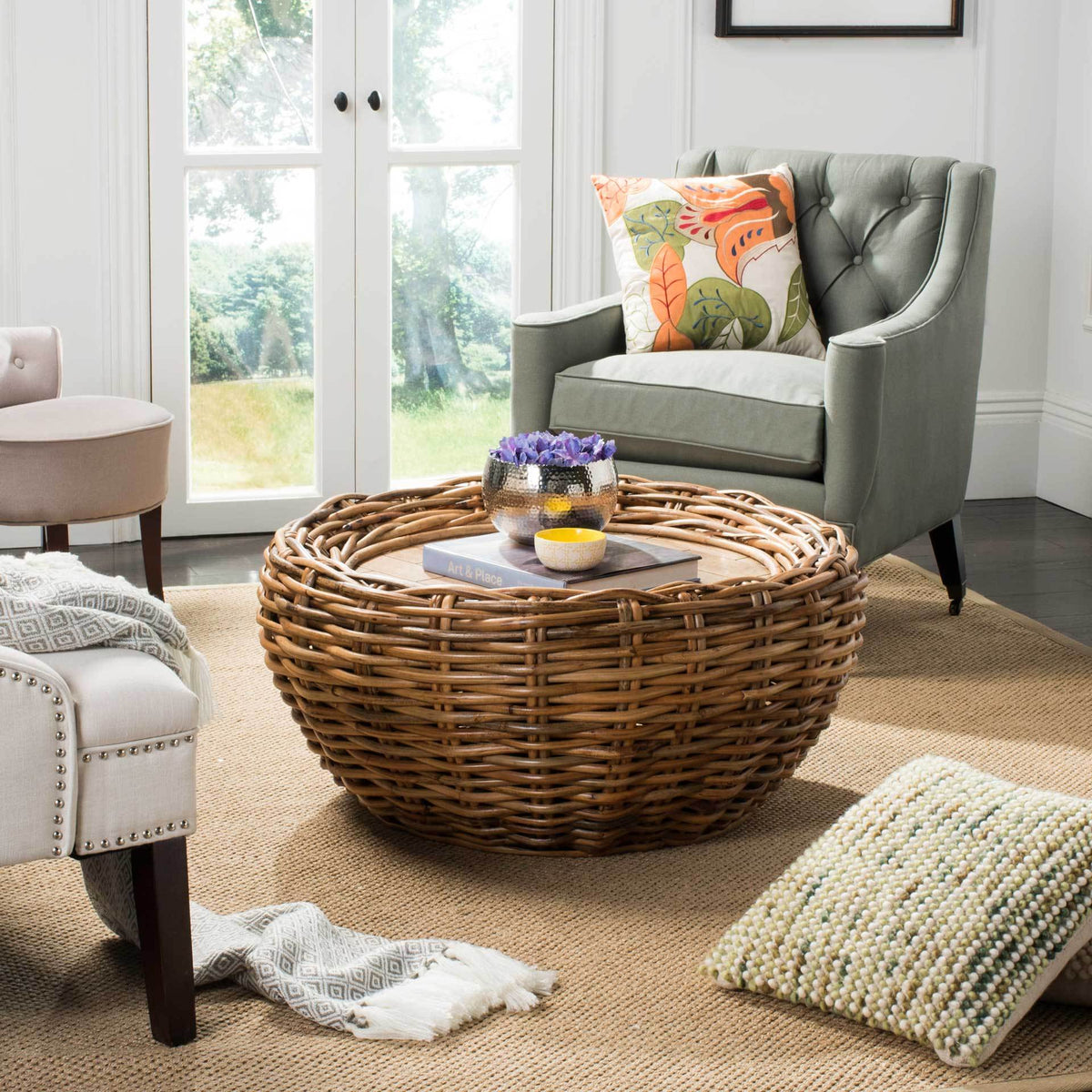 Warm, textured rattan and a smooth wood top bring relaxed style to the living area.