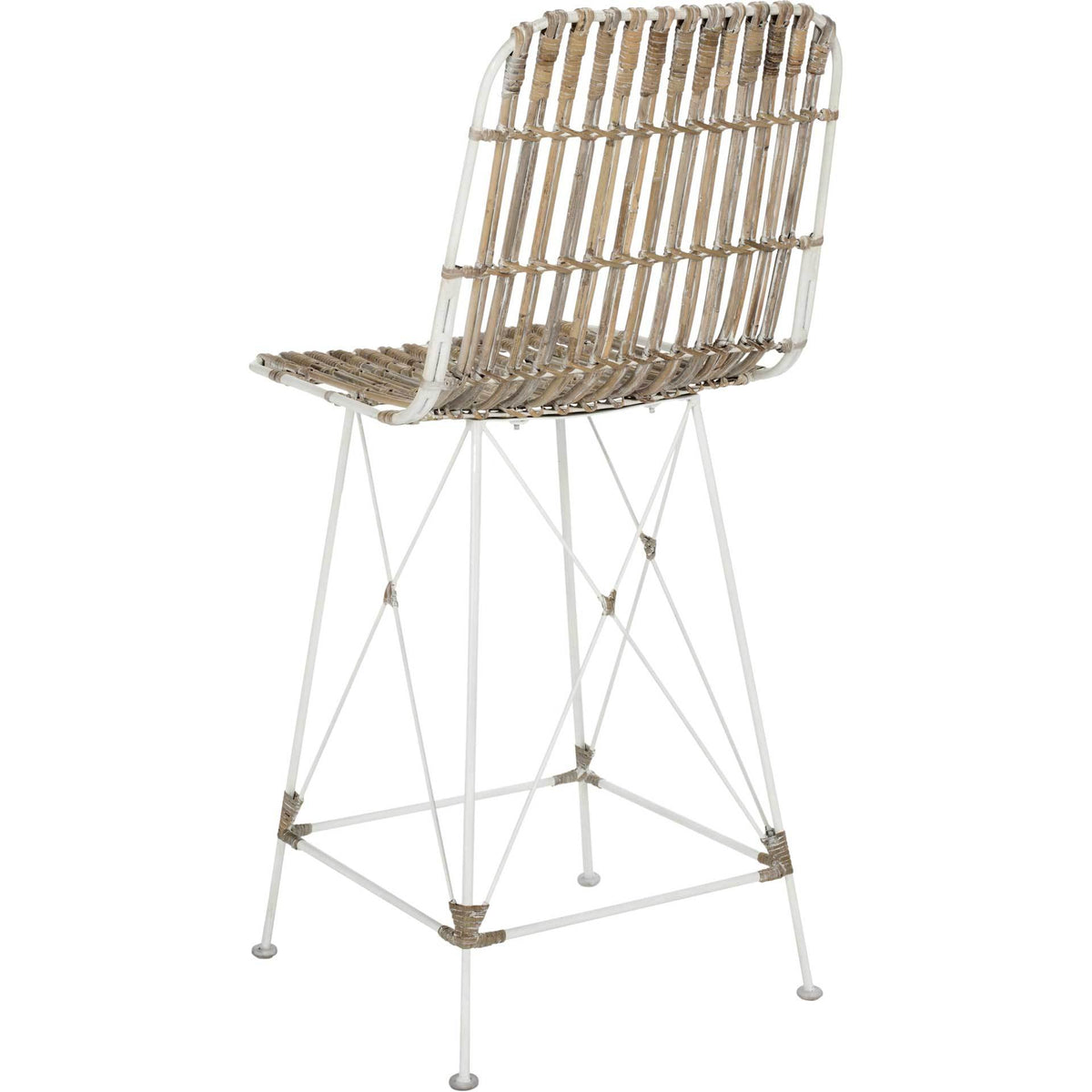 Textured whitewashed rattan slats flow from the backrest into the seat above a light iron frame