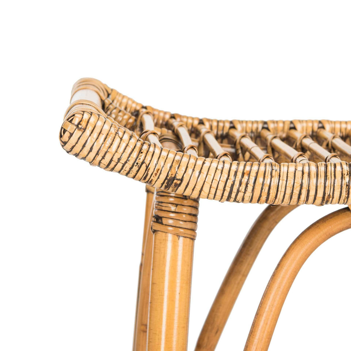 Honey-brown rattan wraps the curved seat rim above the bar stool's smooth supports