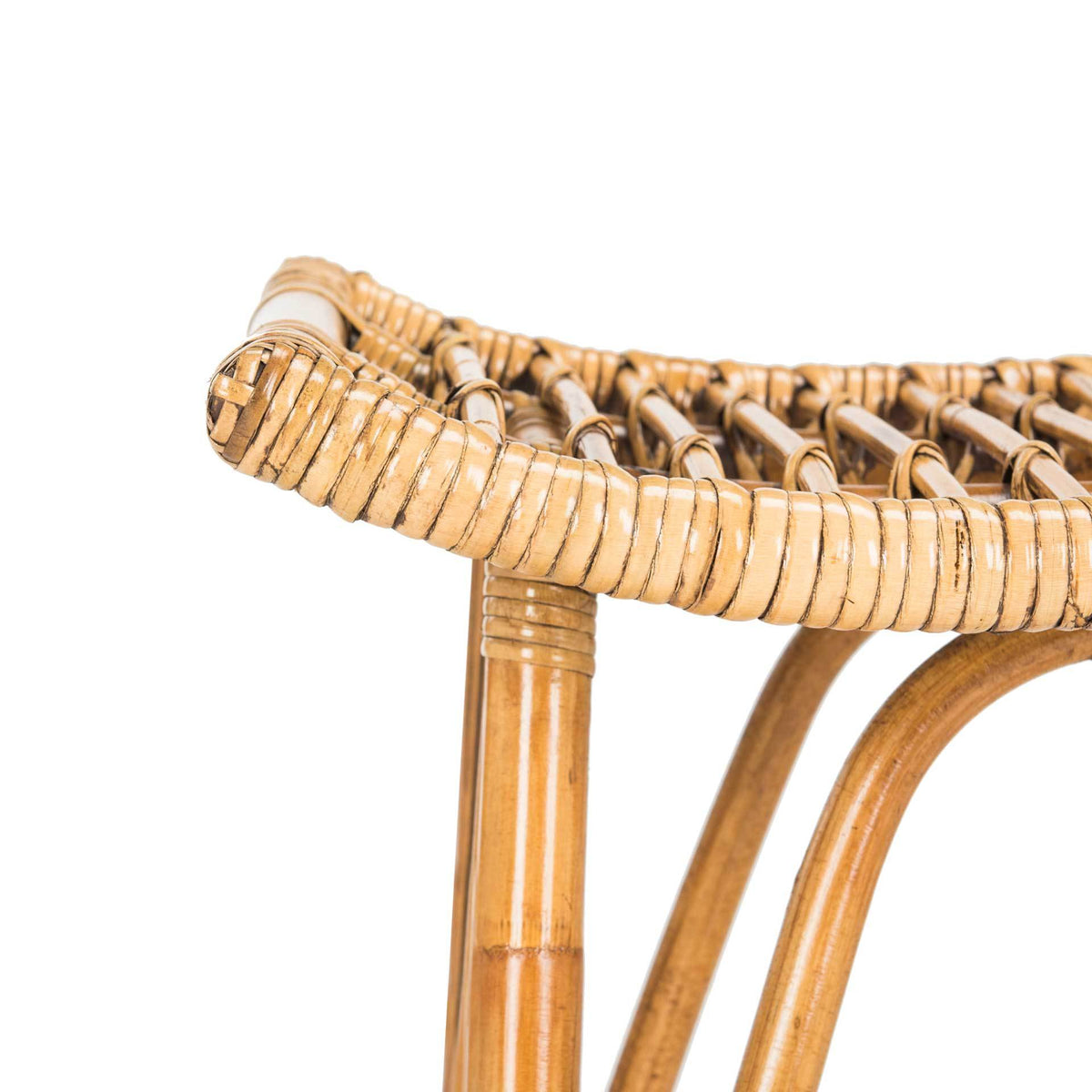 Wrapped seat edge, open rattan weave, and curving support highlight handcrafted character