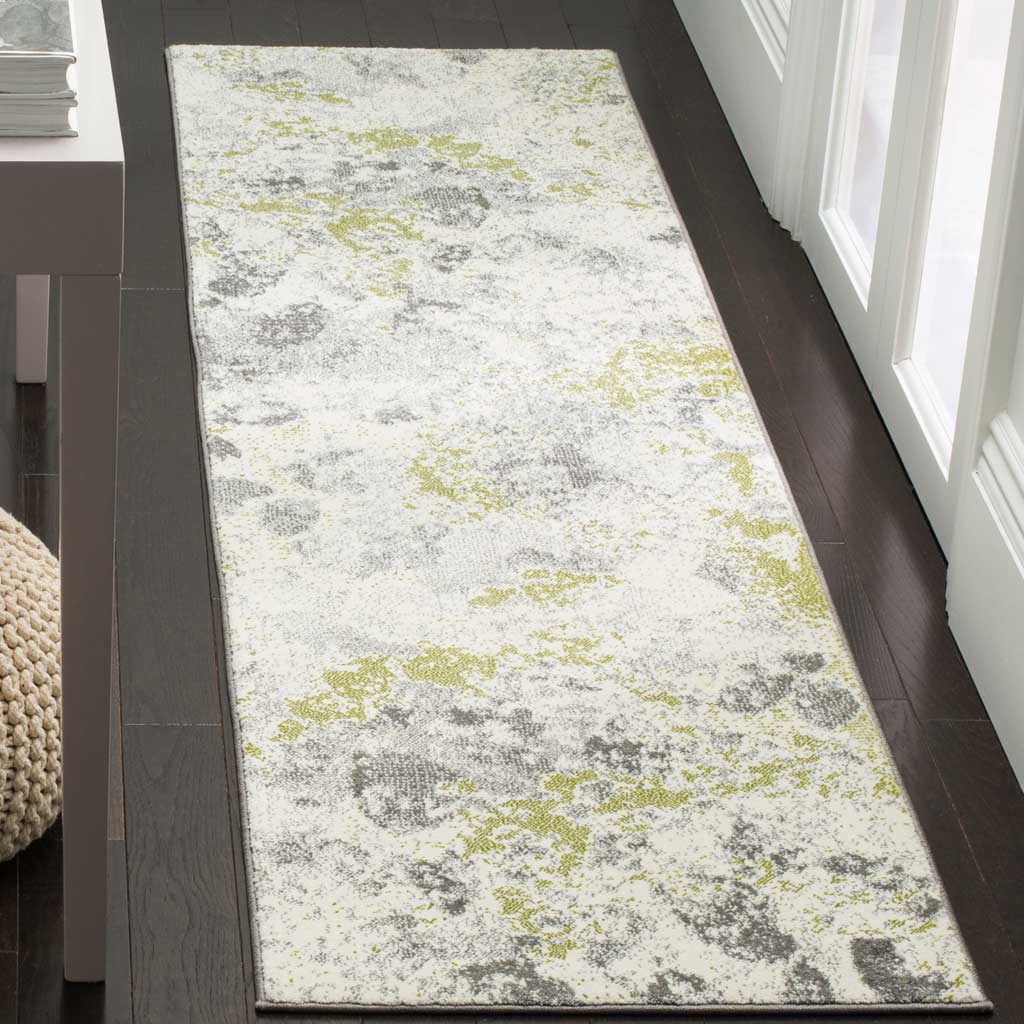 Soft ivory runner with layered gray and green accents that brighten a narrow space