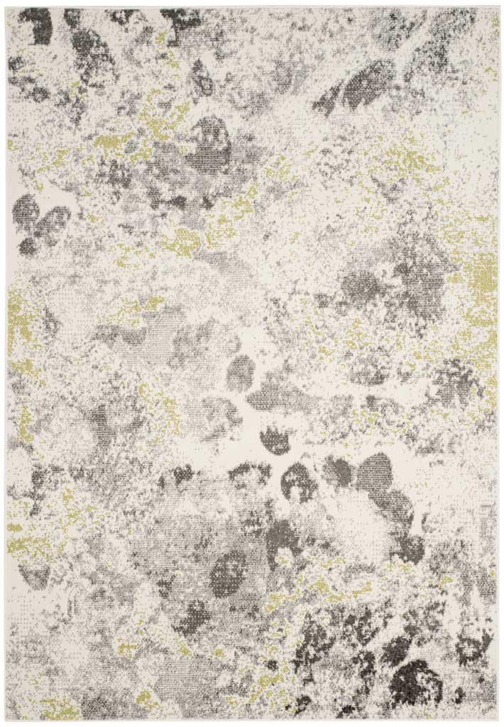 Ivory area rug with scattered gray patches and light green accents for modern texture.