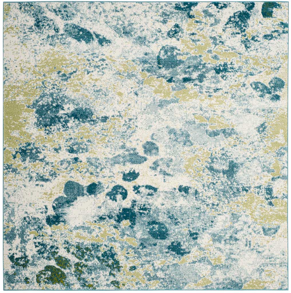 Square ivory rug blends ocean-blue markings and warm golden patches in an abstract design.